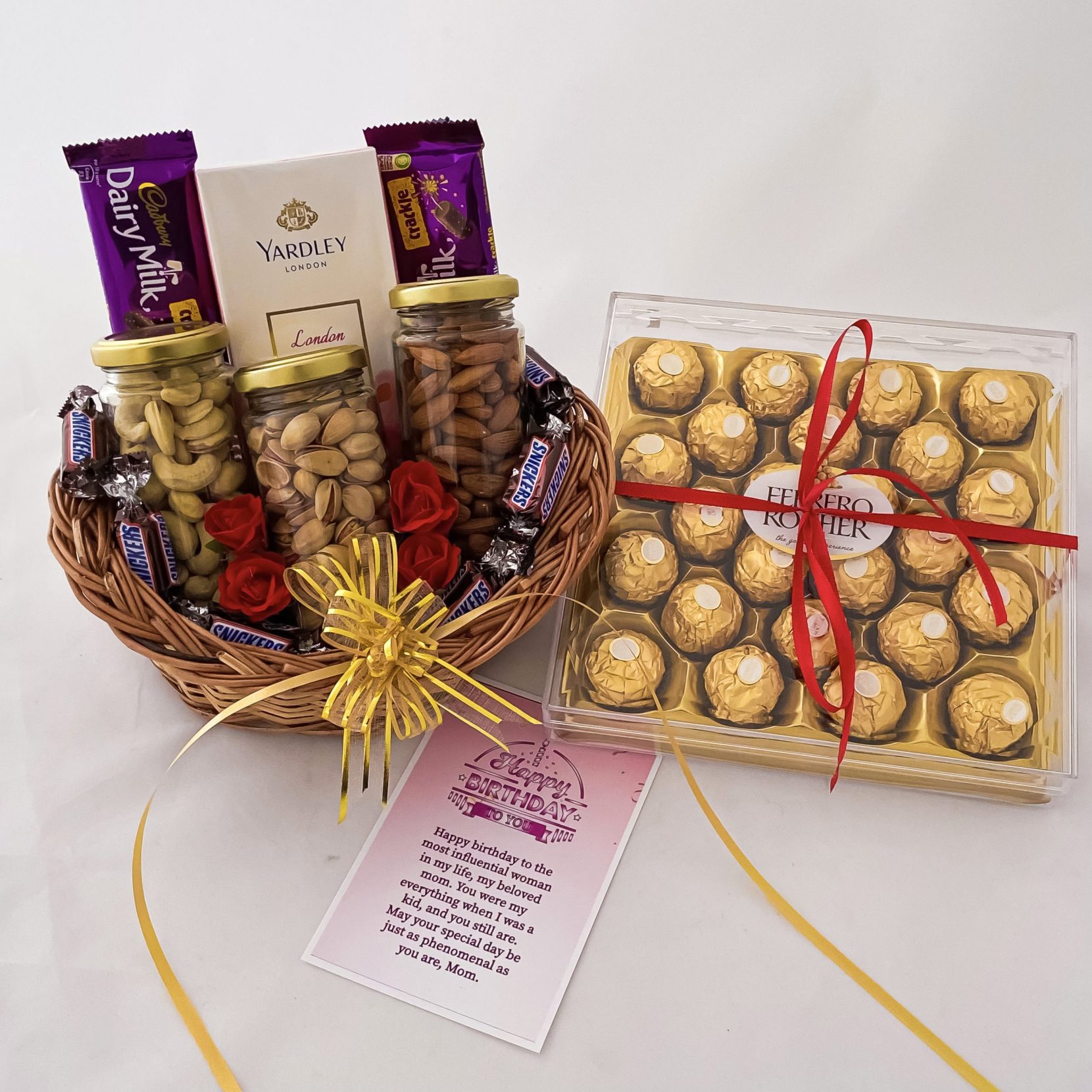 Delightful Birthday gift hamper with lovely nuts bottles,snickers,ferrero rocher,diary milk,perfume and a sweet greetings.