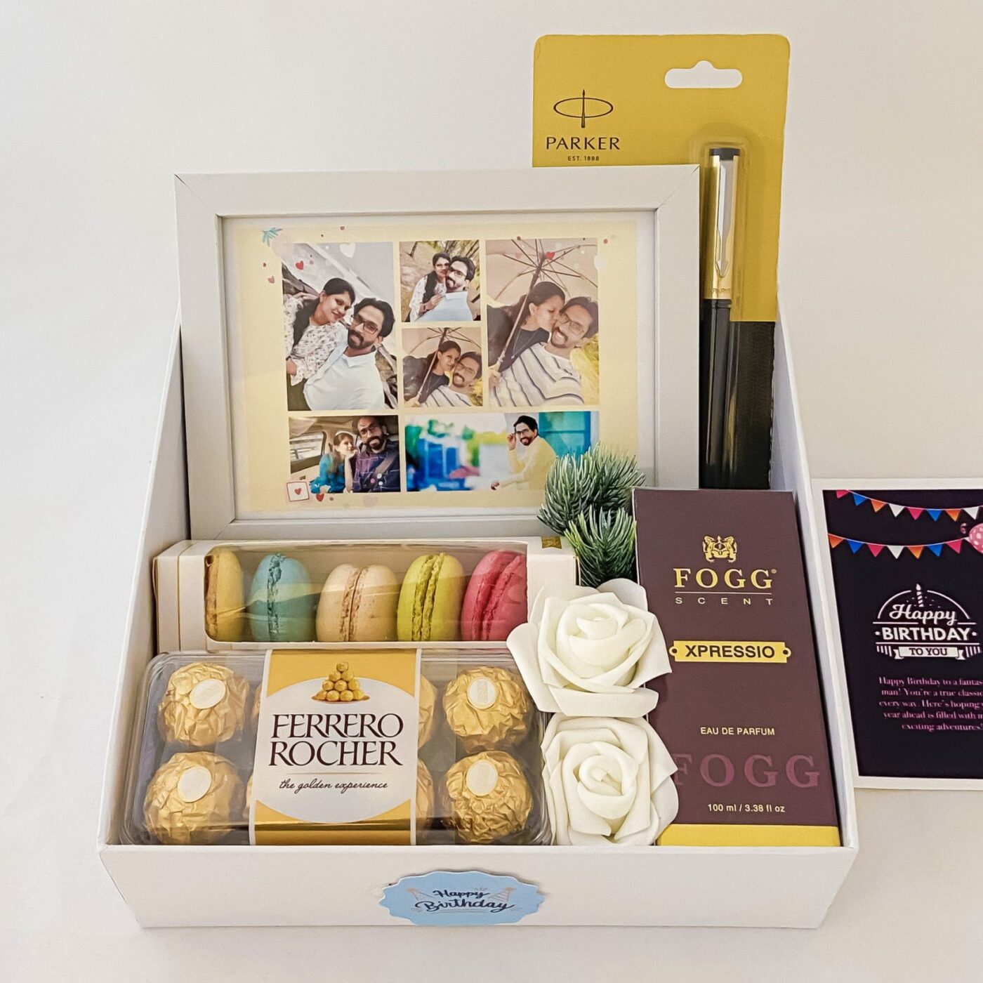 Elegant Birthday gift hamper with lovely frame ,macrons and a sweet greetings.