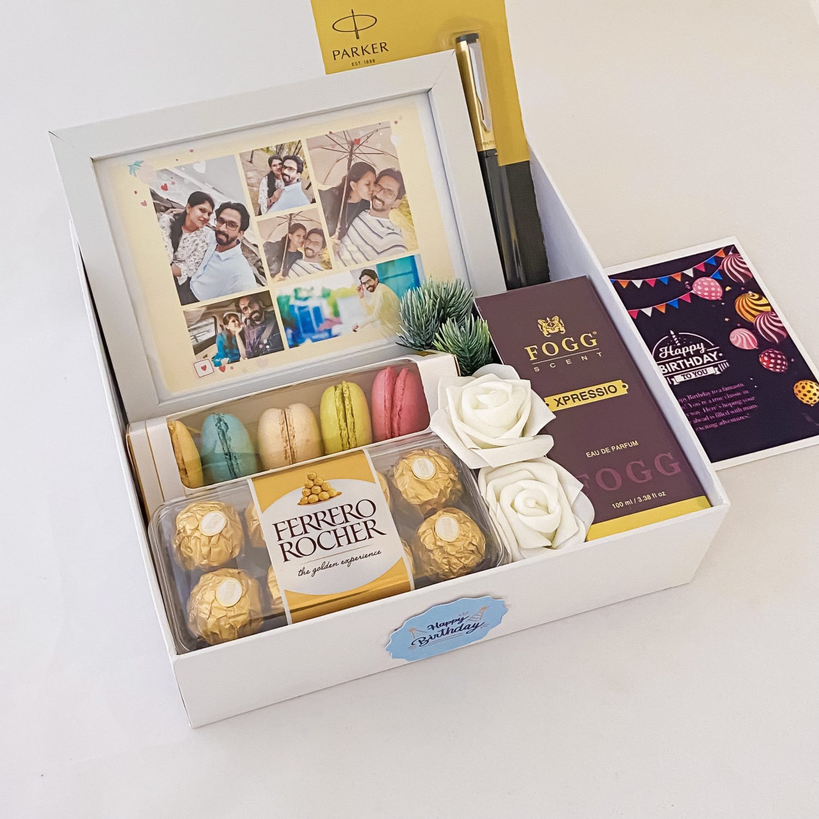 Elegant Birthday gift hamper with lovely frame ,macrons and a sweet greetings.